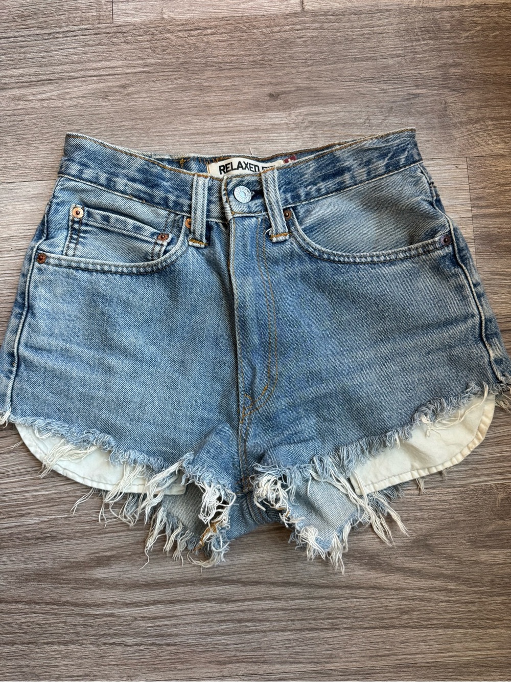Vintage Levi’s 550 Cutoff Denim Shorts Light Wash Frayed Raw Hem Relaxed Fit